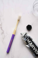 Dermatheek De Kadootjes Eco Recyclebare Tandenborstelhoes en Bamboe Tandenborstelset Paars Dermatheek